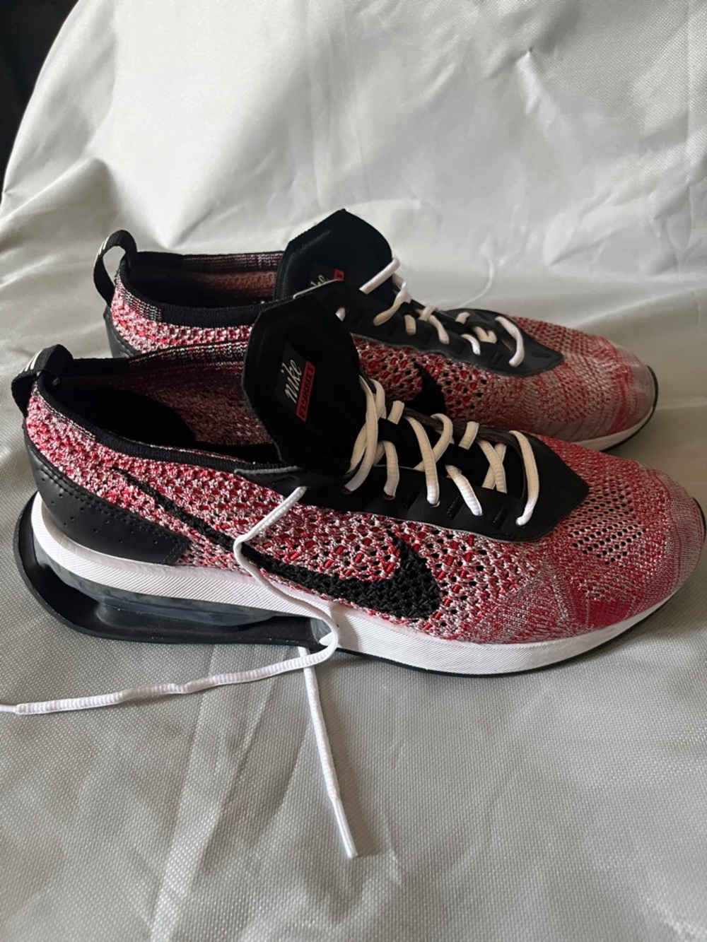 Nike Flyknit Running Sneakers in Red, Black, White